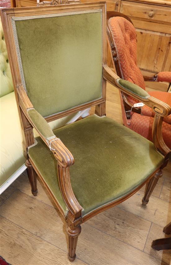 A Louis XVI style walnut framed fauteuil